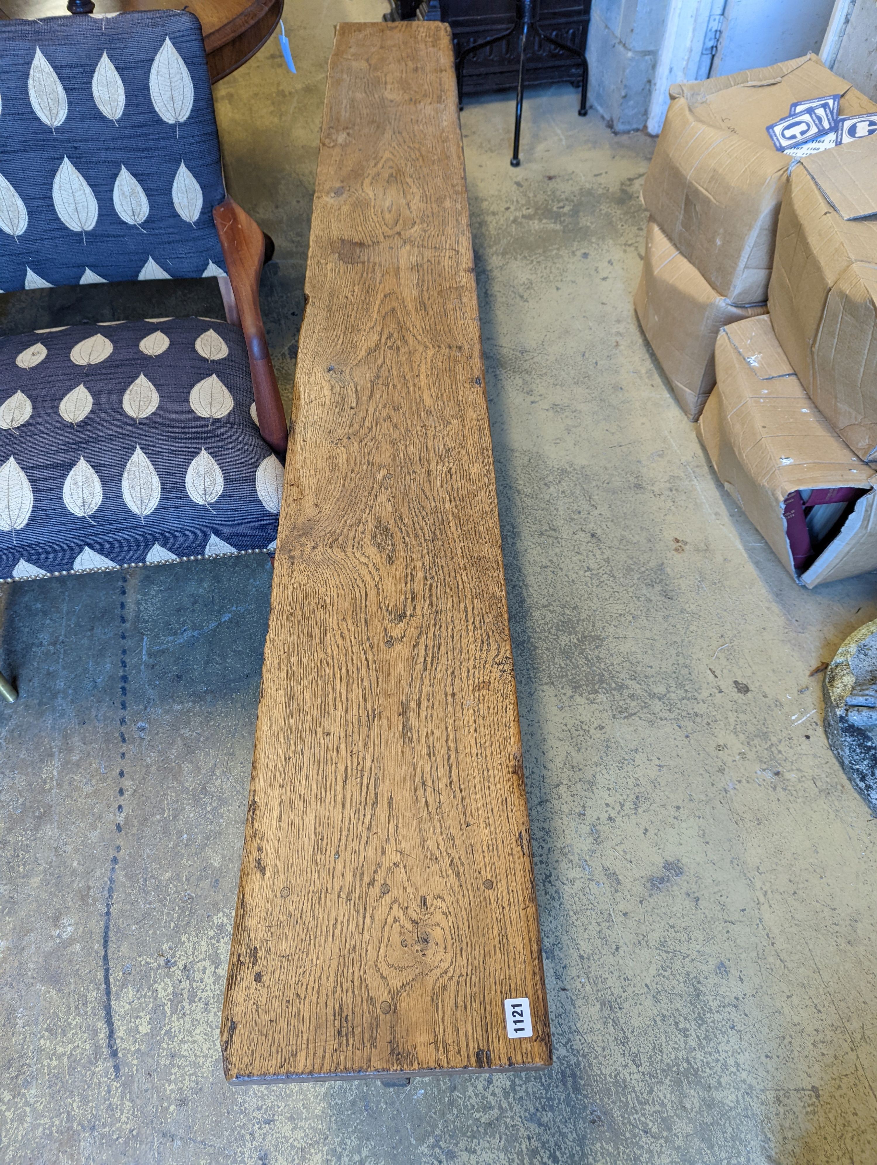 A pair of 18th century style oak benches, length 234cm, depth 30cm, height 46cm
